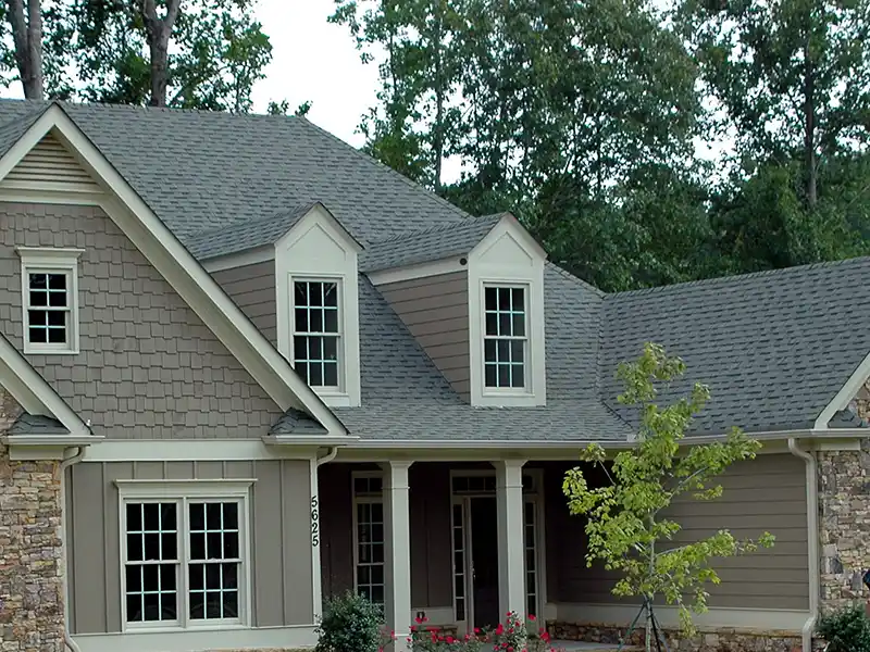 Home with a gray shingle roof